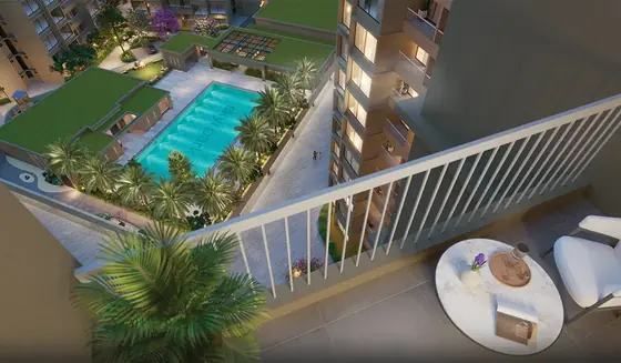 Balcony seating overlooking the landscaped podium and swimming pool at SKYi Park
